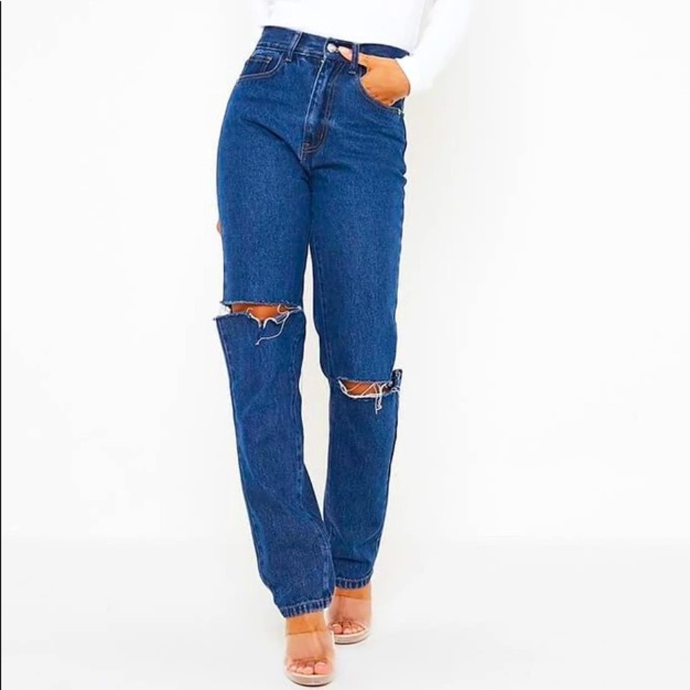 Dark wash distressed denim jeans